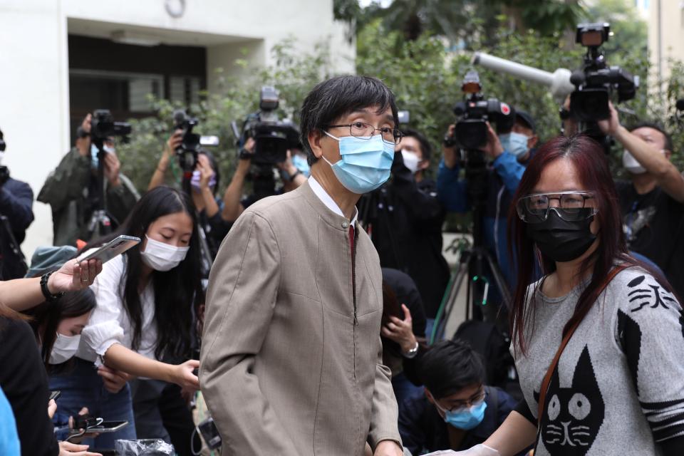 Yuen Kwok-Yung who is part of the Government expert team on Covid-19 is seen after inspecting a residential building on December 10, 2020 in Hong Kong, China. The Government has decided to evacuate some flats inside a Tower 8 of Richland Gardens a residential housing block in Kowloon Bay district, the building has been experiencing an outbreak of Covid-19 cases, this comes as Hong Kong is facing a four wave of COVID-19 cases and the government implementing tough restrictions to curved the spread of the Coronavirus. (Photo by Vernon Yuen/NurPhoto via Getty Images)