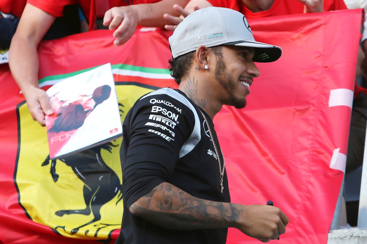 On the move: Lewis Hamilton is expected to leave Mercedes for Ferrari in 2025 (AP)