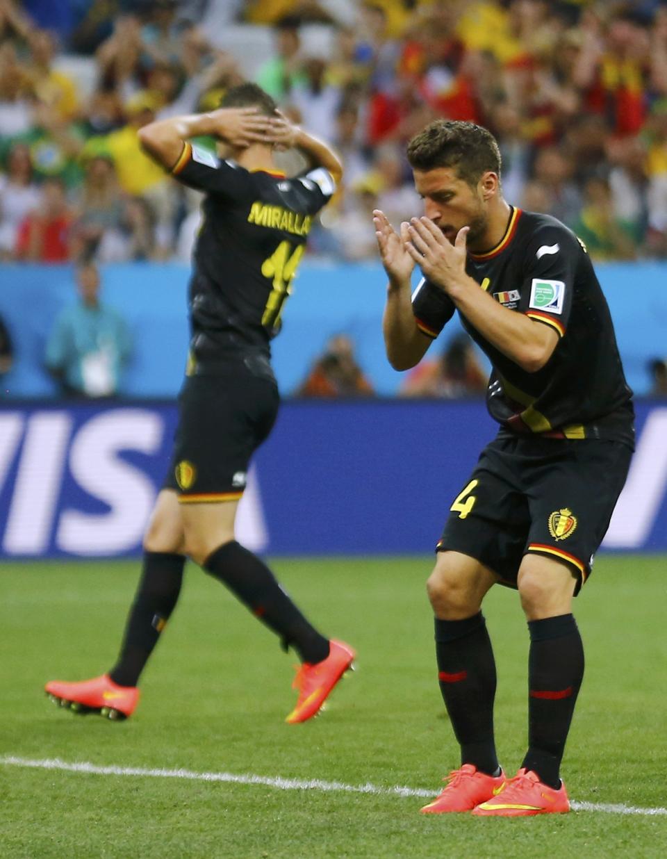 Belgium's Dries Mertens reacts after missing his goal shot during the 2014 World Cup Group H soccer match between Belgium and South Korea at the Corinthians arena