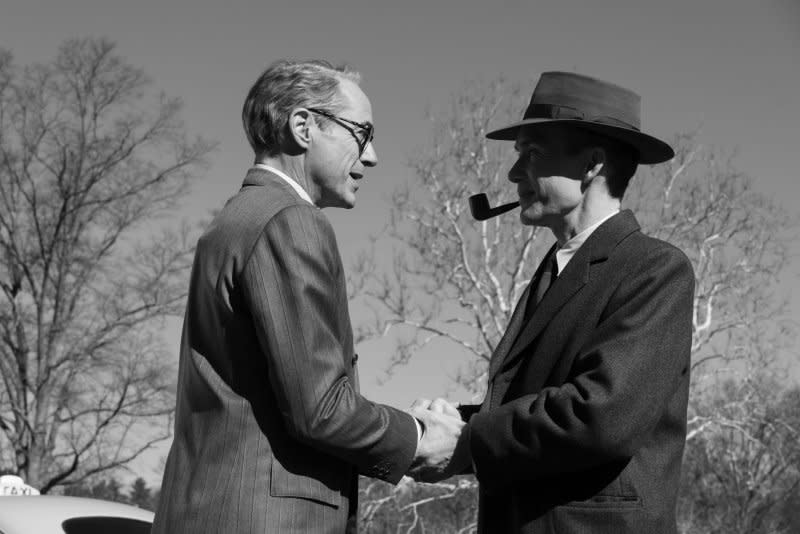 Lewis Strauss (Robert Downey Jr., L) and J .Robert Oppenheimer (Cillian Murphy) discuss top secret matters. Photo courtesy of Universal Pictures