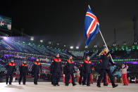 <p>Flag bearer Freydis Halla Einarsdottir of Iceland and teammates enter the stadium during the Opening Ceremony of the PyeongChang 2018 Winter Olympic Games at PyeongChang Olympic Stadium on February 9, 2018 in Pyeongchang-gun, South Korea. (Photo by Matthias Hangst/Getty Images) </p>