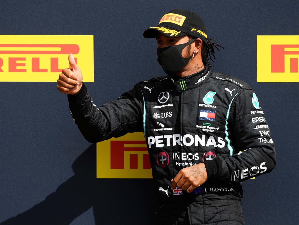 Lewis Hamilton celebrates his victory in the British Grand Prix: Getty