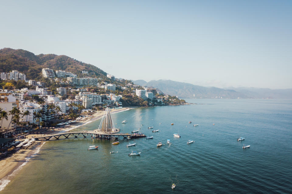 Mexico, Jalisco, Aerial view of Playa Los Muertos, beach and pier in Puerto Vallarta