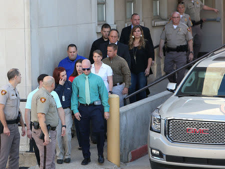 Tulsa police officer Betty Shelby arrives for her arraignment after she was charged with manslaughter in the death of Terence Crutcher, at Tulsa County Courthouse in Tulsa, Oklahoma, U.S. September 30, 2016. REUTERS/Richard Rowe