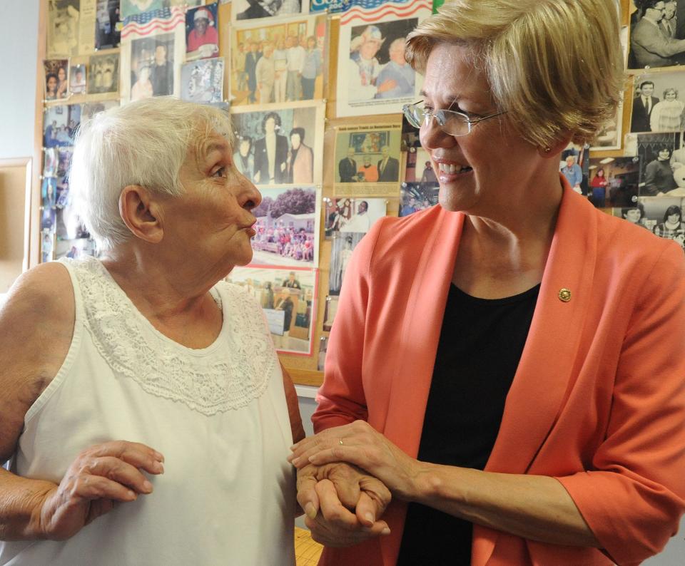 Citizens For citizens Director of Community Organizations Barbara Travis chats with Senator Elizabeth Warren in her Griffin Street office. Travis had been associated with CFC since 1977.