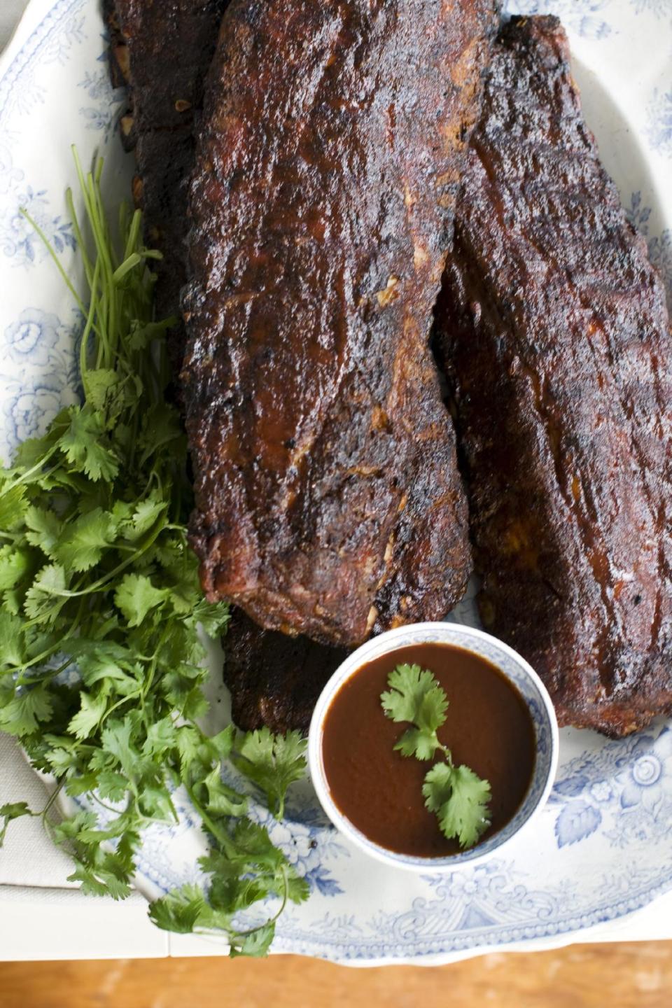 In this image taken on June 3, 2013, Bubba’s Bunch barbecued baby back ribs are shown in Concord, N.H. (AP Photo/Matthew Mead)