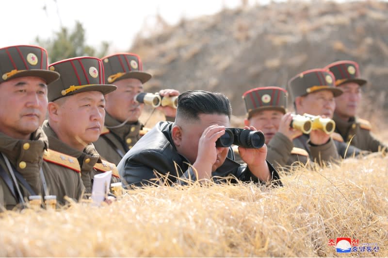 North Korean leader Kim Jong Un guides artillery fire competition in this image released by North Korea's Korean Central News Agency