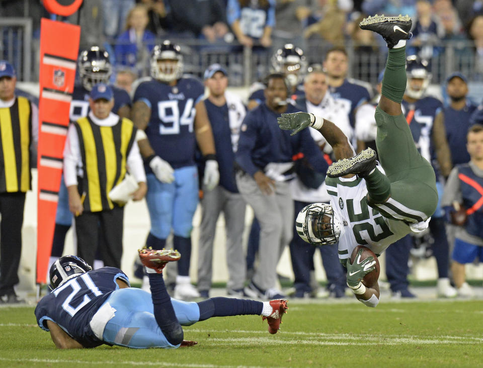 <p>Tennessee Titans cornerback Malcolm Butler (21) takes down New York Jets running back Elijah McGuire (25) in the second half of an NFL football game Sunday, Dec. 2, 2018, in Nashville, Tenn. (AP Photo/Mark Zaleski) </p>