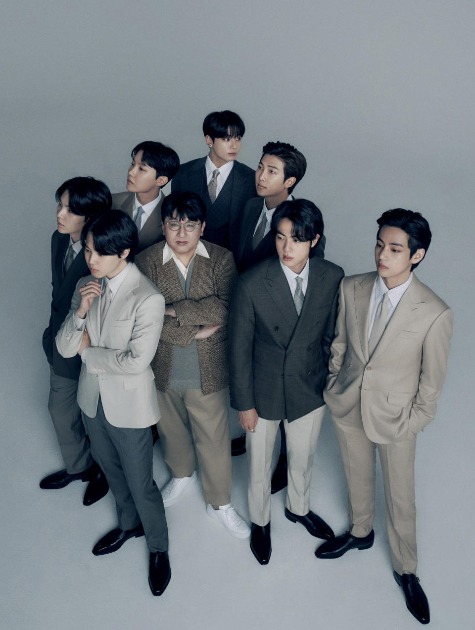 <strong>Mr. Bang Si-Hyuk, chairperson of HYBE, with BTS.</strong> "<a href="https://time.com/collection/time100-companies-2022/6159410/hybe-bang-si-hyuk-bts-interview/" rel="nofollow noopener" target="_blank" data-ylk="slk:HYBE and Bang Si-hyuk Are Transforming the Music Business—With a Little Help From BTS,;elm:context_link;itc:0;sec:content-canvas" class="link ">HYBE and Bang Si-hyuk Are Transforming the Music Business—With a Little Help From BTS,</a>" April 11 issue.<span class="copyright">Hong Jang Hyun for TIME</span>
