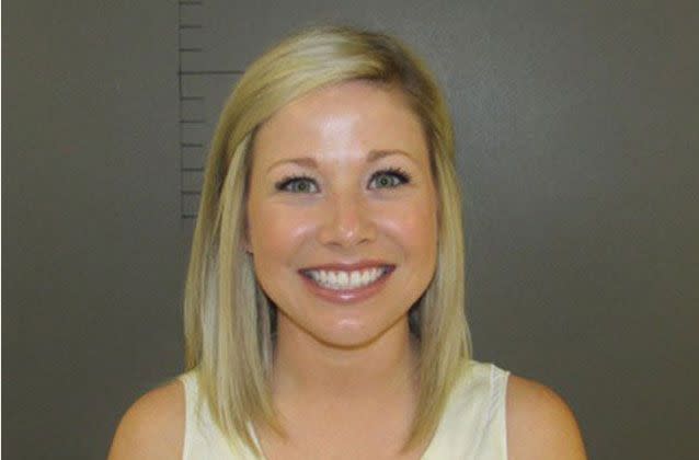 The suspended biology teacher smiled in her mugshots Picture: Lockhart Police Department