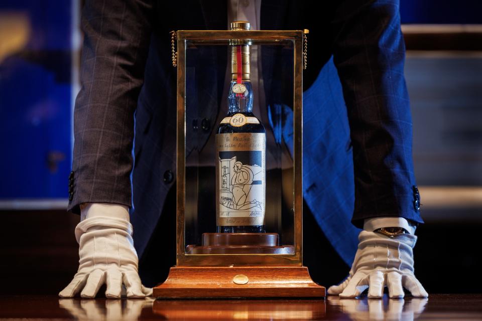 A bottle of The Macallan 1926, the world's most expensive whisky estimated at £750,000- 1,200,000, is unveiled at Sotheby's on October 19, 2023 in London, England.