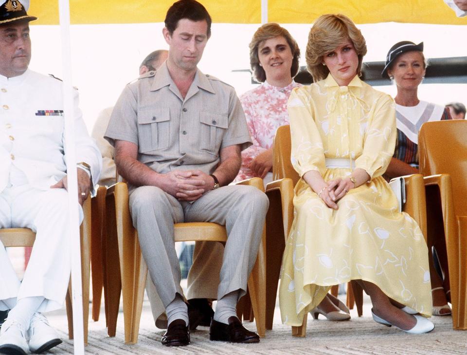 <p>Unclear: if Diana is simply focused or just not into it.</p><p>Clear: that Prince Charles is fully asleep.</p>