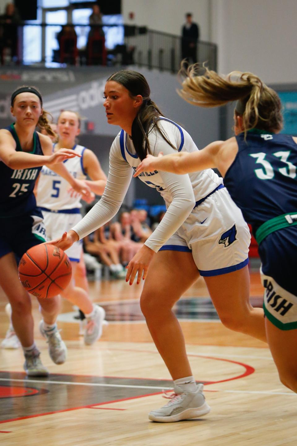 Senior Lauren Luebbert of Marshfield High School dribbles down the court during The Pink & White Lady Basketball Classic at the O'Reilly Family Event Center on Wednesday, Dec. 27, 2023.