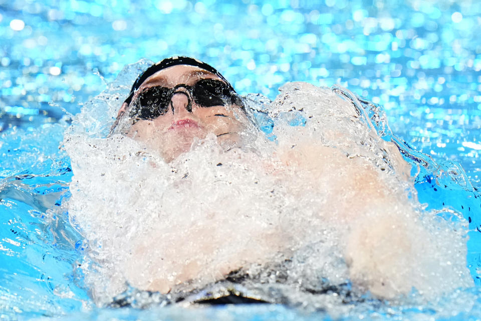 Hunter Armstrong of Team United States swims in the Men's 4x100m Medley Relay final at the World Aquatics Championships in Doha, Qatar, Sunday, Feb. 18, 2024. (AP Photo/Hassan Ammar)