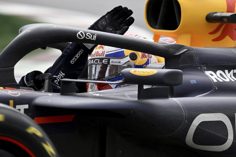 Red Bull driver Max Verstappen, of the Netherlands, salutes following his win during the Canadian Grand Prix Formula 1 car race, in Montreal,, Sunday, June 9, 2024. (Jacques Boissino/The Canadian Press via AP)