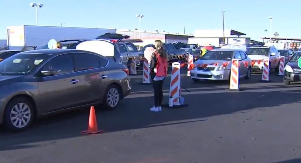 <p>Cars queue up at St Mary’s Food Bank in Phoenix,  Arizona on Wednesday</p>Fox News