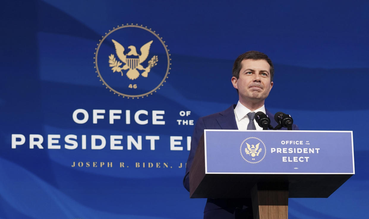 Former South Bend, Ind. Mayor Pete Buttigieg, President-elect Joe Biden's nominee to be transportation secretary, speaks after Biden announced his nomination during a news conference at The Queen theater in Wilmington, Del., Wednesday, Dec. 16, 2020. (Kevin Lamarque/Pool via AP)