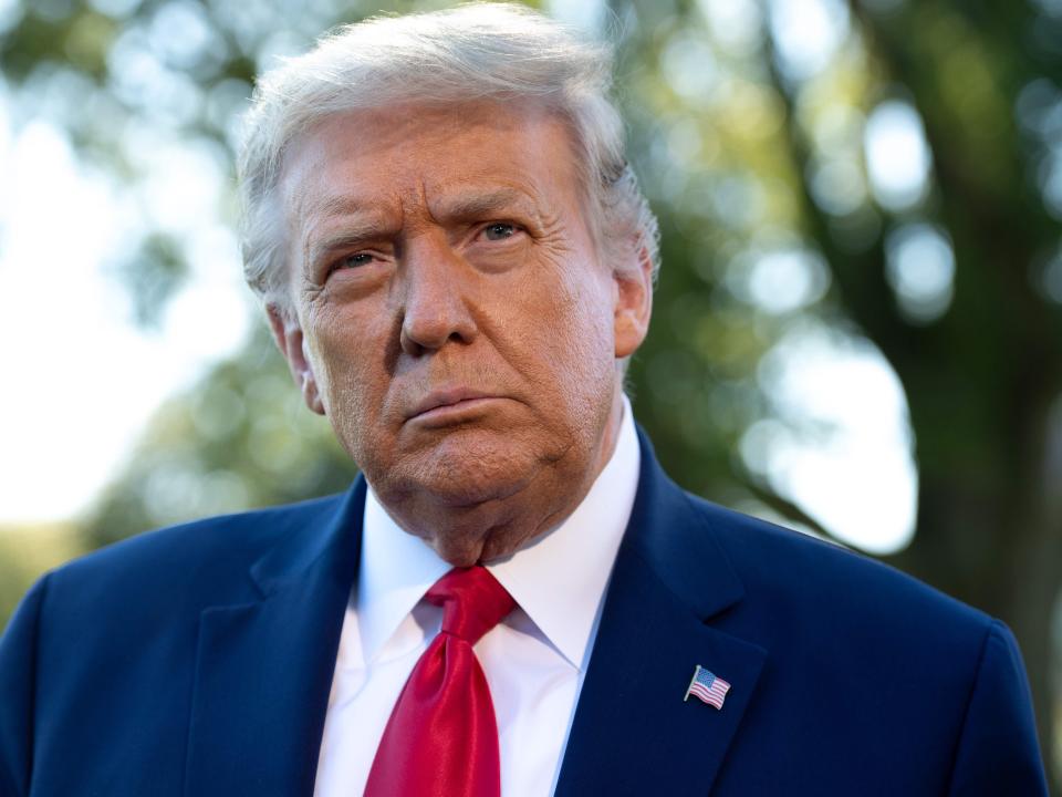 <p>Donald Trump speaks to the media prior to departing from the South Lawn of the White House in Washington, DC, 21 September, 2020</p> (AFP via Getty Images)