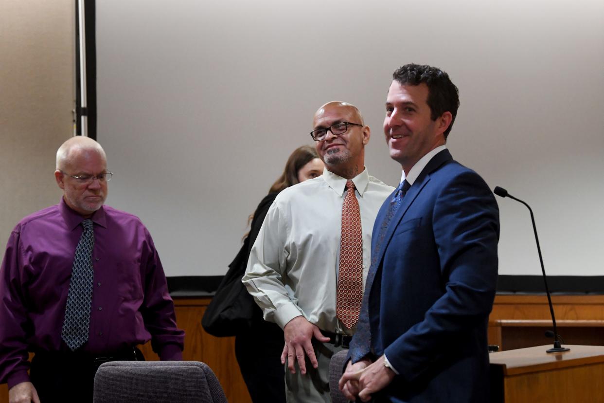 Defense attorney John Taylor, right, and Jaime Villarreal react on Thursday, July 6, 2023, after Judge David Worley issued a sentence of time served for possessing a firearm during a 2019 self-defense shooting in Oxnard.