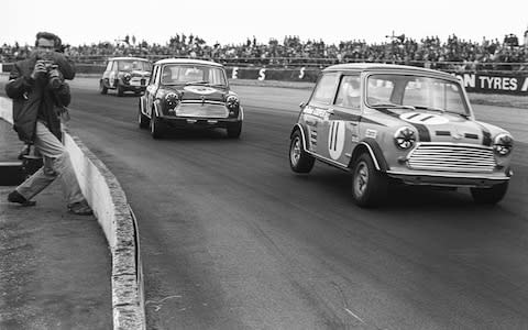 British Grand Prix. Silverstone. 1969, Touring Cars. Steve Neal, Britax Cooper Downton. John Rhodes, British Leyland Mini Cooper S. John Handley, British Leyland Mini Cooper S. - Credit: Mike Hayward/Mike Hayward Collection