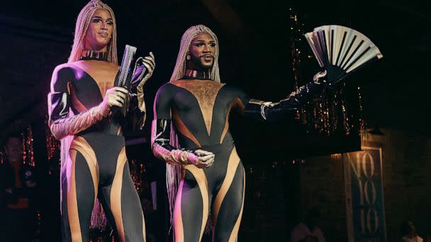 PHOTO: A Drag Queen duo salutes during a show to set a Guinness World record for the largest Drag brunch at Brooklyn Bowl, June 10, 2023, in New York. (Andres Kudacki/AP)