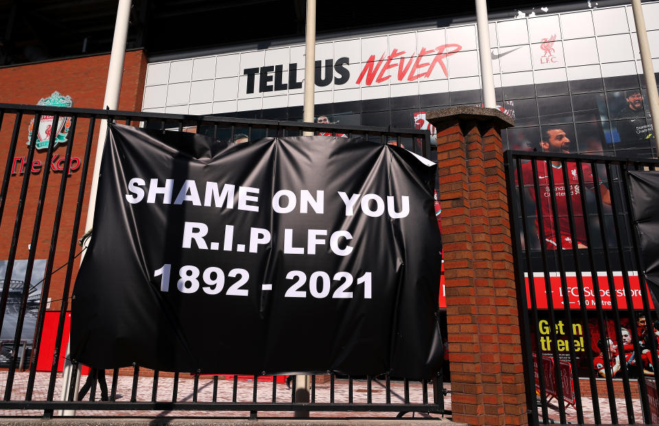 <p>Banners are placed outside of Anfield, home of Liverpool FC by fans to protest against its decision to be included amongst the clubs attempting to form a new European Super League. Picture date: Monday April 19, 2021.</p>
