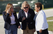 Rep. Debbie Mucarsel-Powell, D-Fla., left, Rep. Sylvia Garcia, D-Texas, center, and Rep. Donna Shalala talk after a tour the Homestead Temporary Shelter for Unaccompanied Children, Tuesday, Feb. 19, 2019, in Homestead, Fla. (AP Photo/Wilfredo Lee)