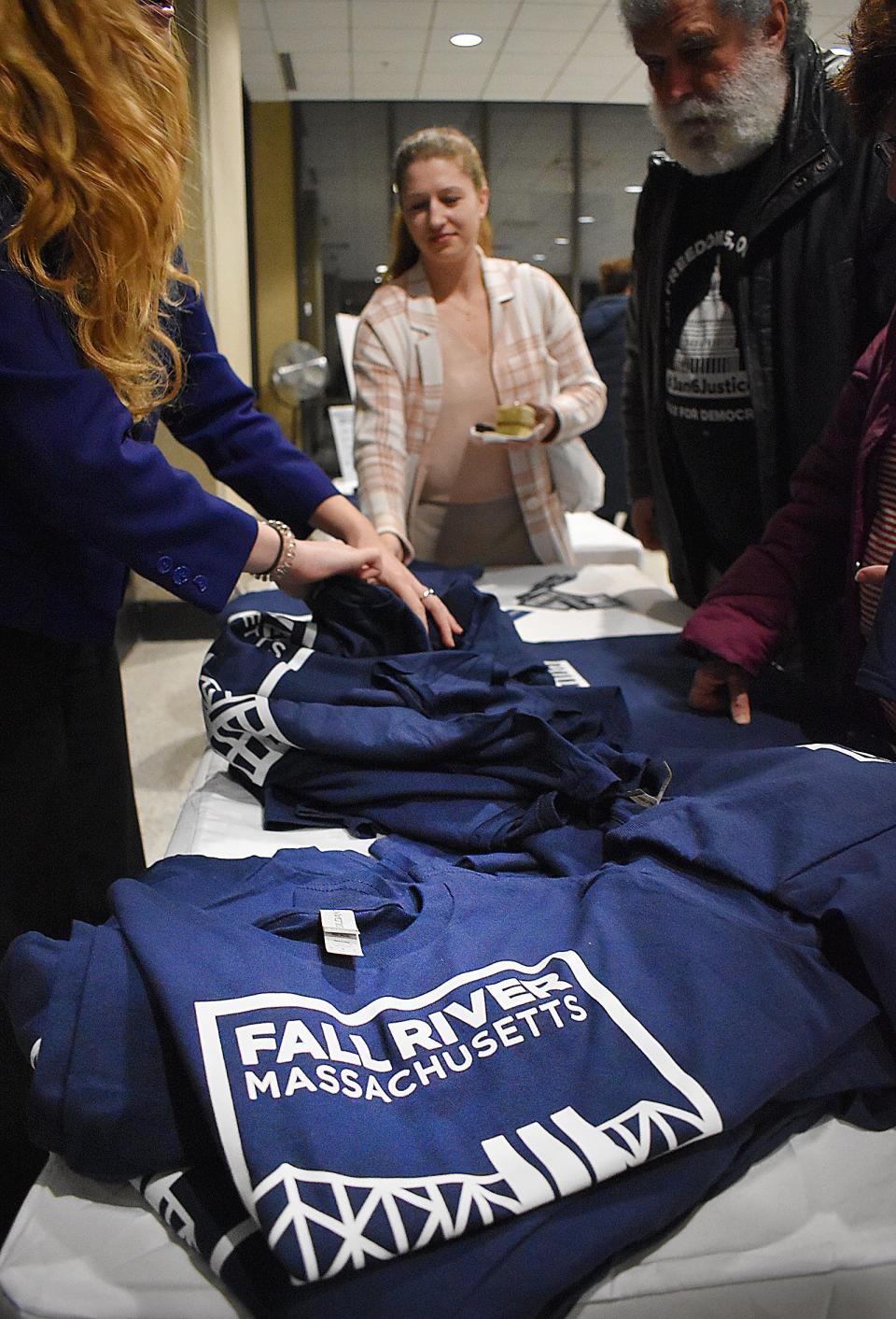 T-shirts and stickers featuring the new city logo were handed out at the Fall River logo unveiling event on Tuesday, Jan. 31, at Government Center.