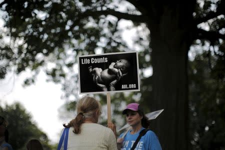 Women attend a "Women Betrayed Rally to Defund Planned Parenthood" at Capitol Hill in Washington July 28, 2015. REUTERS/Carlos Barria