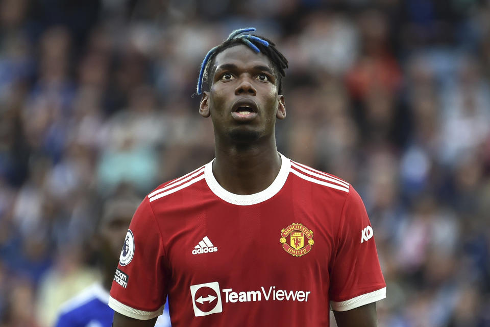 FILE - Manchester United's Paul Pogba looks up during the English Premier League soccer match between Leicester City and Manchester United at King Power stadium in Leicester, England, Saturday, Oct. 16, 2021. French prosecutors are investigating allegations that World Cup winner Paul Pogba was targeted by extortion attempts by his brother and childhood friends. The Paris prosecutor's office said Monday Aug. 29, 2022 it opened an investigation earlier this month into attempted organized extortion, which is being handled by anti-corruption police. (AP Photo/Rui Vieira, File)