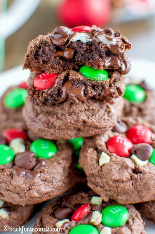 <p>Back For Seconds</p><p>These soft, thick, and chewy Chocolate Peppermint M&M Cookies are the perfect easy Christmas cookie recipe! The green and red make them extra festive! </p><p>Get the recipe: <a href="http://backforseconds.com/chocolate-peppermint-m-and-m-cookies/" rel="nofollow noopener" target="_blank" data-ylk="slk:Chocolate Peppermint M&M Cookies;elm:context_link;itc:0;sec:content-canvas" class="link rapid-noclick-resp"><strong>Chocolate Peppermint M&M Cookies</strong></a></p>