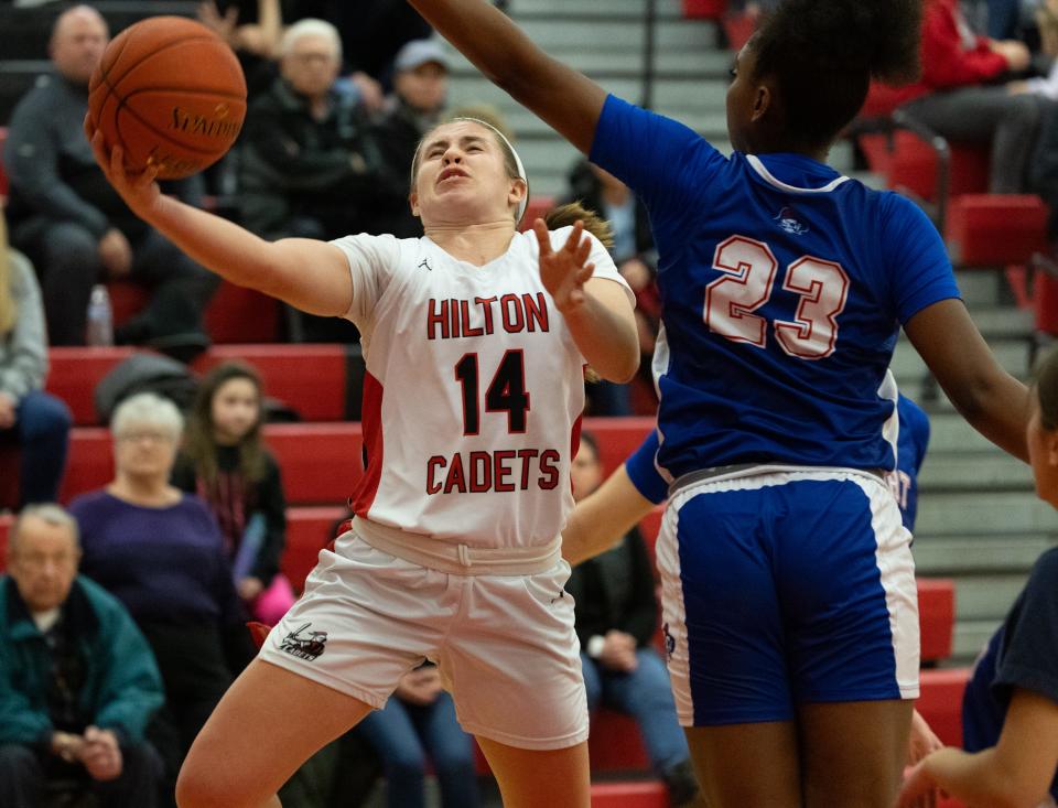 Hilton's Mallory Heise goes for a layup against Fairport Friday, Jan. 19 at Hilton High School.