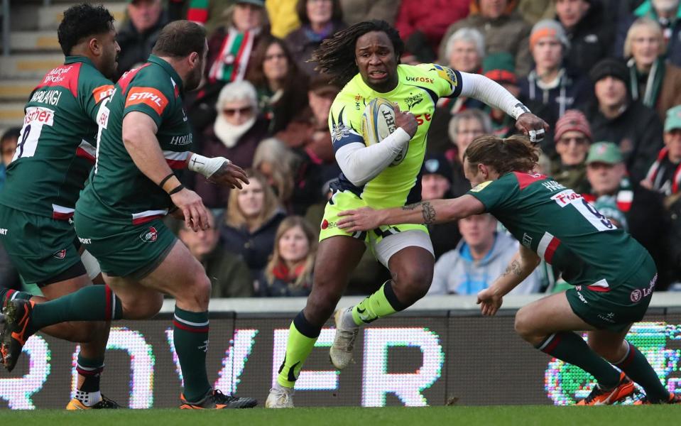 Hunted by Tigers: Sale debutant Marland Yarde is surrounded by tacklers - CameraSport