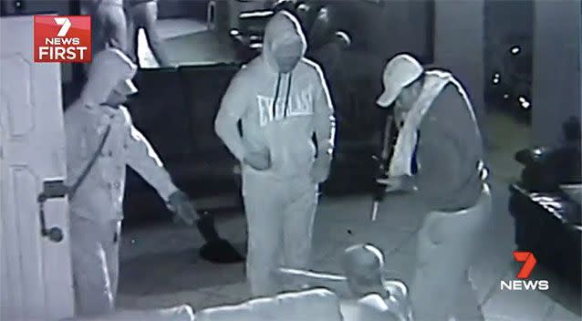 Three gunmen burst into a Sydney brothel, holding a gun to the owner's head in a terrifying armed robbery. Source: 7 News