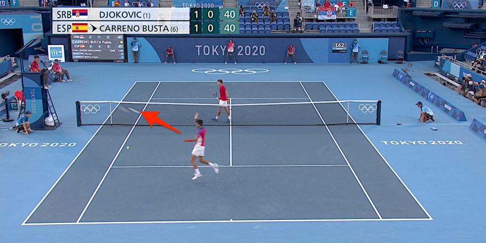 Novak Djokovic throws his racket during the Tokyo Olympics.