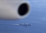 In this May 14, 2019, photo provided by the Philippine Coast Guard, a Chinese Coast Guard ship is seen while American and Philippine coast guards conduct joint search and rescue and capability-building exercises off South China Sea west of the Philippines. Captain John Driscoll, commanding officer of the U.S. Coast Guard National Security Cutter Bertholf (WMSL 750), told reporters Wednesday, May 15, 2019, two Chinese Coast Guard ships were spotted off the South China Sea while they were conducting the joint exercise with Philippine Coast Guard. (Philippine Coast Guard Via AP)