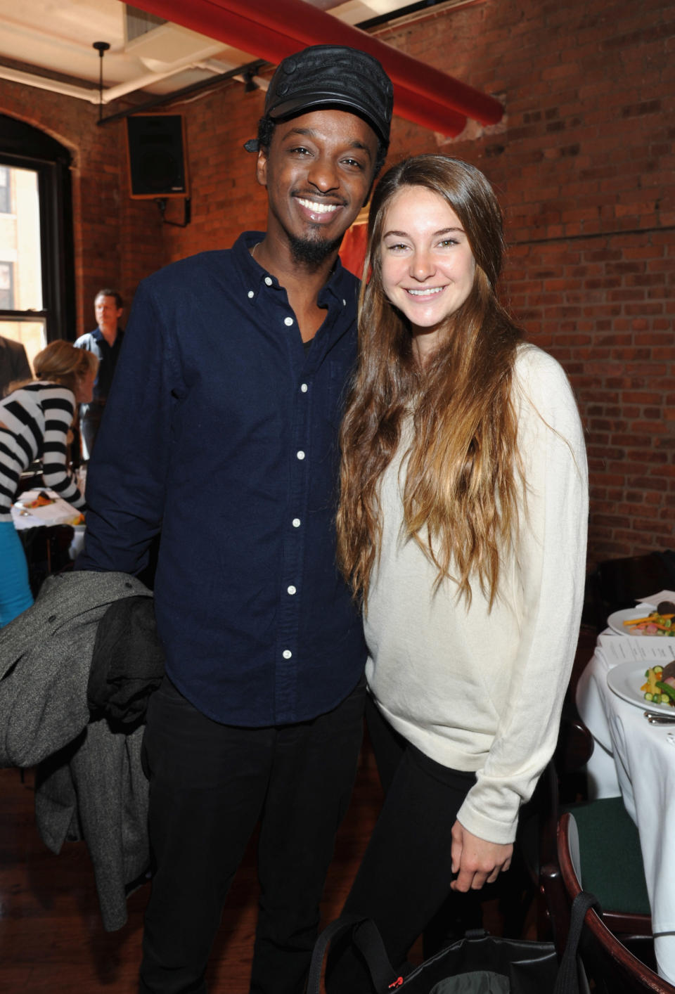 NEW YORK, NY - APRIL 19: Singer K'naan and actress Shailene Woodley attend the 2012 Tribeca Film Festival Jury lunch at the Tribeca Grill Loft on April 19, 2012 in New York City. (Photo by Mike Coppola/Getty Images for Tribeca Film Festival)