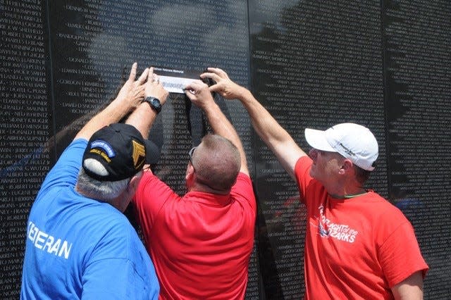 Veterans were able to make rubbings of names on the Vietnam Memorial Wall during the Honor Flight of the Ozarks trip to Washington, D.C. on Aug. 23, 2022.