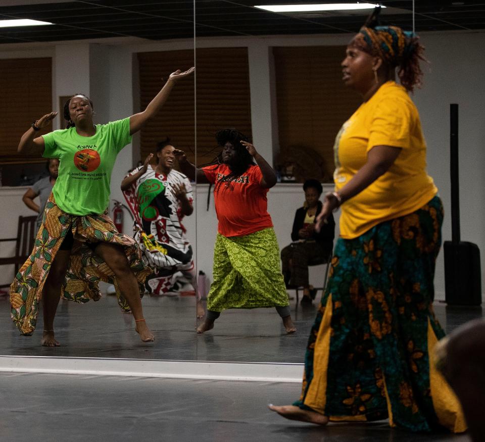 Dancers groove to live percussion music as the Ayoka Afrikan Drum and Dance Incorporation rehearses on Monday, Feb. 6, 2023 in Tallahassee, Fla. 