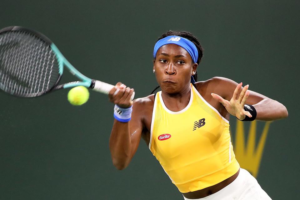 Coco Gauff returns a shot to Claire Lu during the BNP Paribas Open in Indian Wells, Calif., on March 11, 2022.  