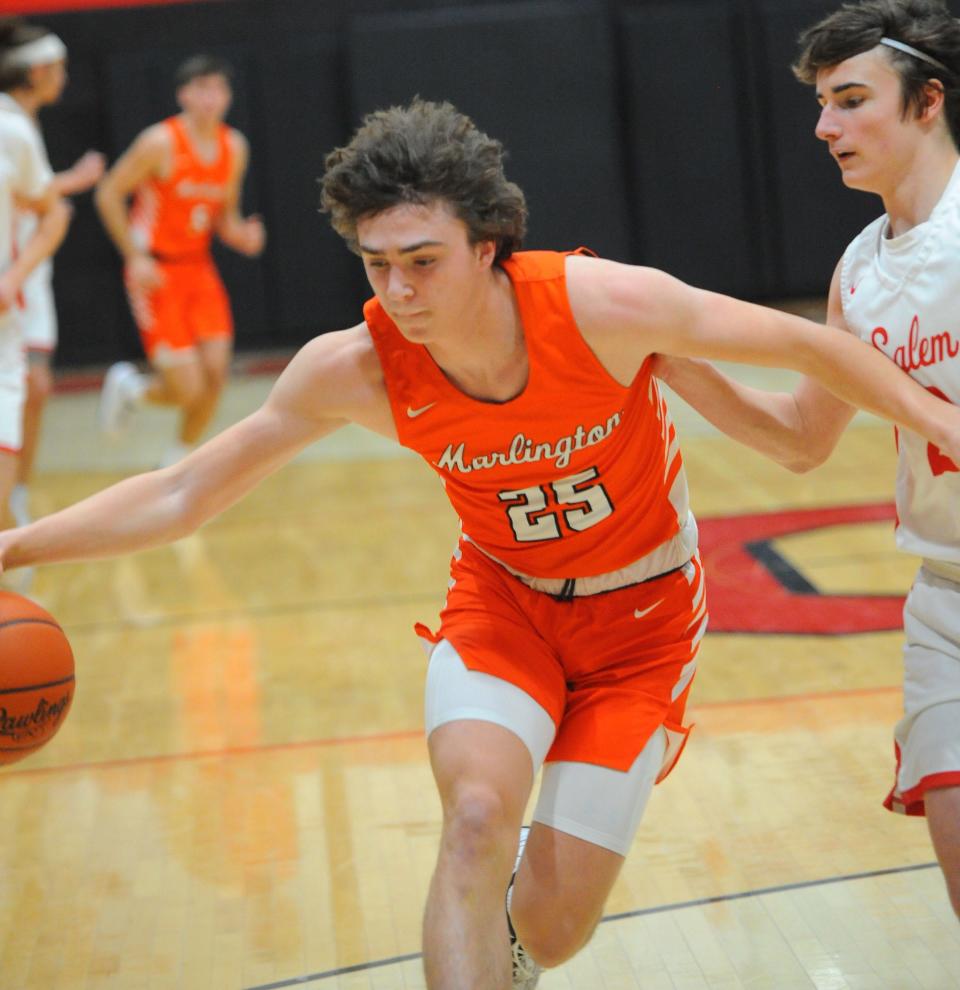 Marlington's Tommy Skelding handles the ball in an Eastern Buckeye Conference game against the Quakers at Salem High School Tuesday, January 25, 2022.