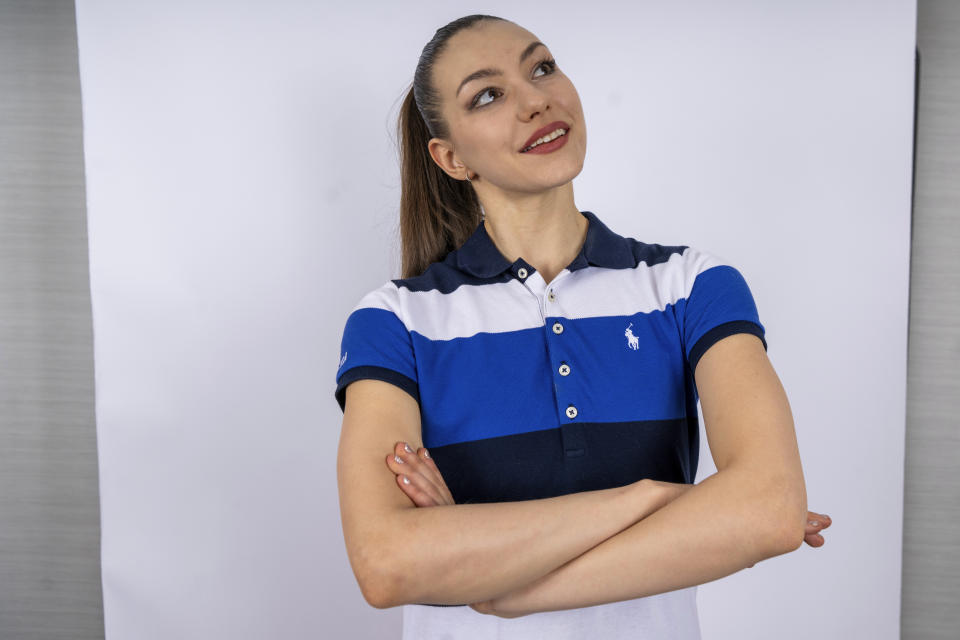 FILE - American gymnast Evita Griskenas, 23, poses for a portrait on Monday, April 15, 2024 in New York. Rhythmic gymnast Evita Griskenas' core memories of the Olympics have to do with ... herself. Evita drew pictures of Evita on a medal stand and envisioned herself winning one of those medals someday. (AP Photo/Brittainy Newman, File)