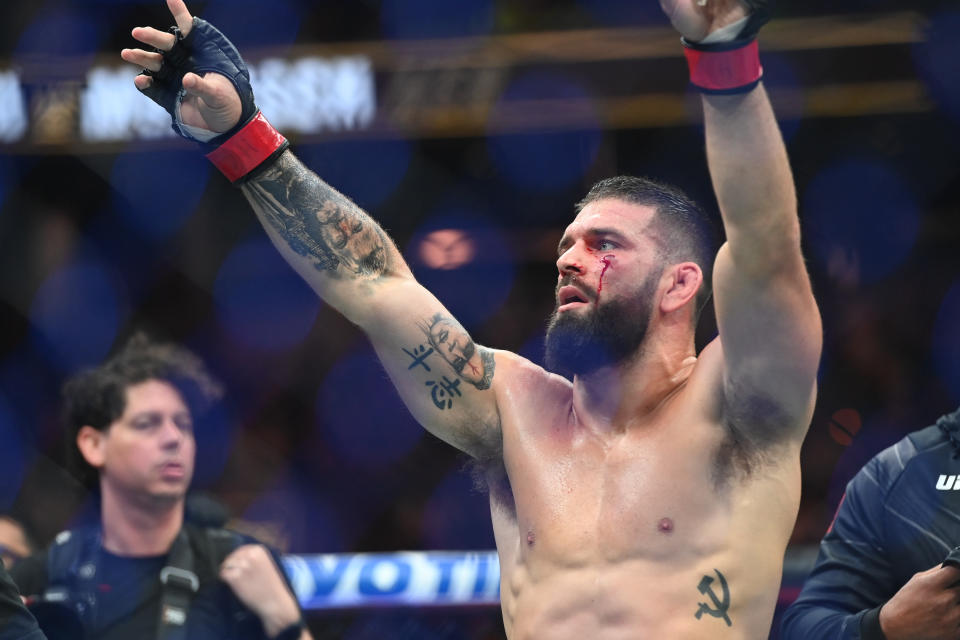 Aug 19, 2023; Boston, MA, USA; Andre Petroski (red gloves) reacts to defeating Gerald Meerschaert (blue gloves) during UFC 292 at TD Garden. Mandatory Credit: Bob DeChiara-USA TODAY Sports