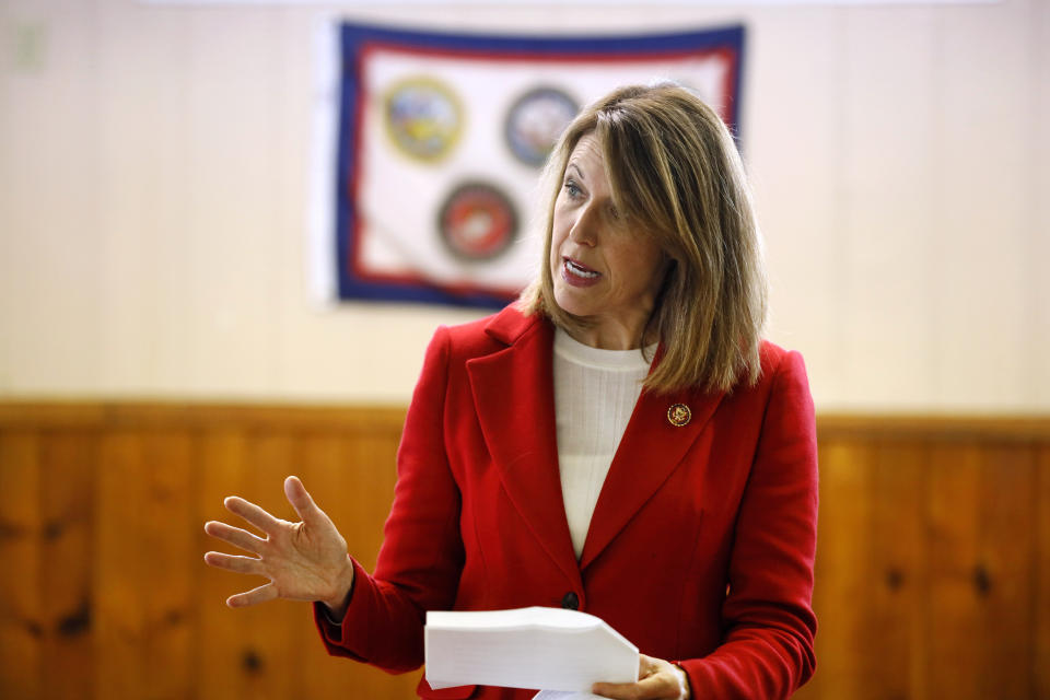 FILE - In this Nov. 11, 2019 file photo, U.S. Rep. Cindy Axne, D-Iowa, speaks to local residents at the American Legion Post 184 in Winterset, Iowa. The U.S. Chamber of Commerce has decided to endorse 23 freshmen House Democrats in this fall’s elections. The move represents a gesture of bipartisanship by the nation's largest business organization, which has long leaned strongly toward Republicans. (AP Photo/Charlie Neibergall)