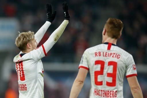 Leipzig's Swedish midfielder Emil Forsberg (L) celebrates scoring with a superbly struck free-kick against Cologne on Saturday