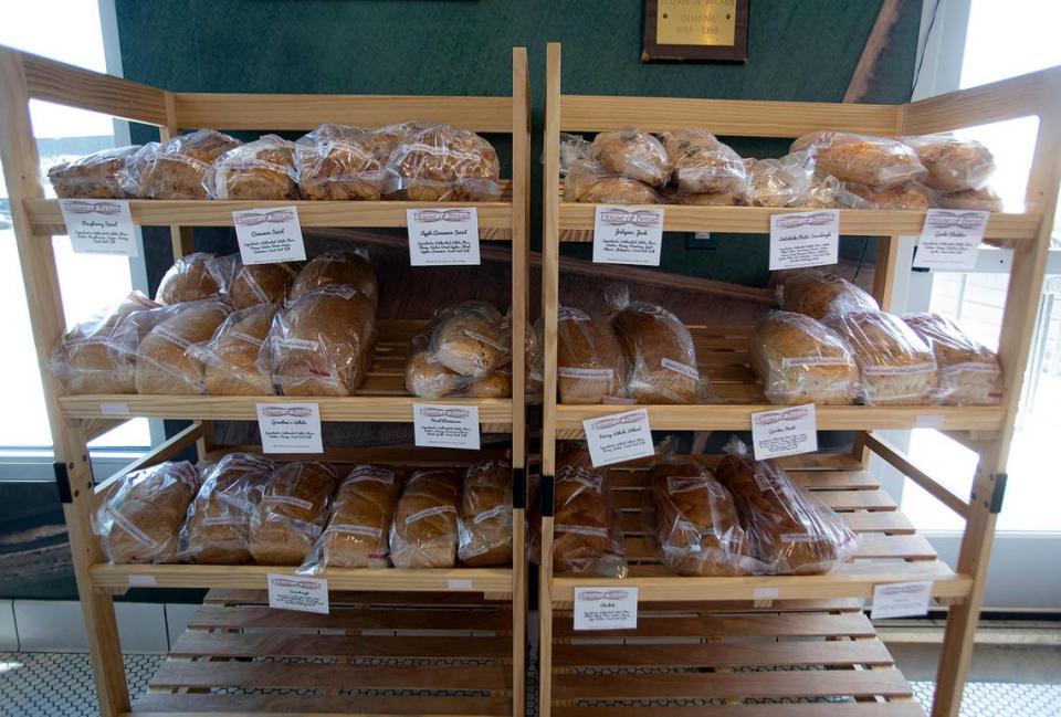 A rack of bread loaves sits beside the front entrance of Farmhouse House of Bread in San Luis Obispo.