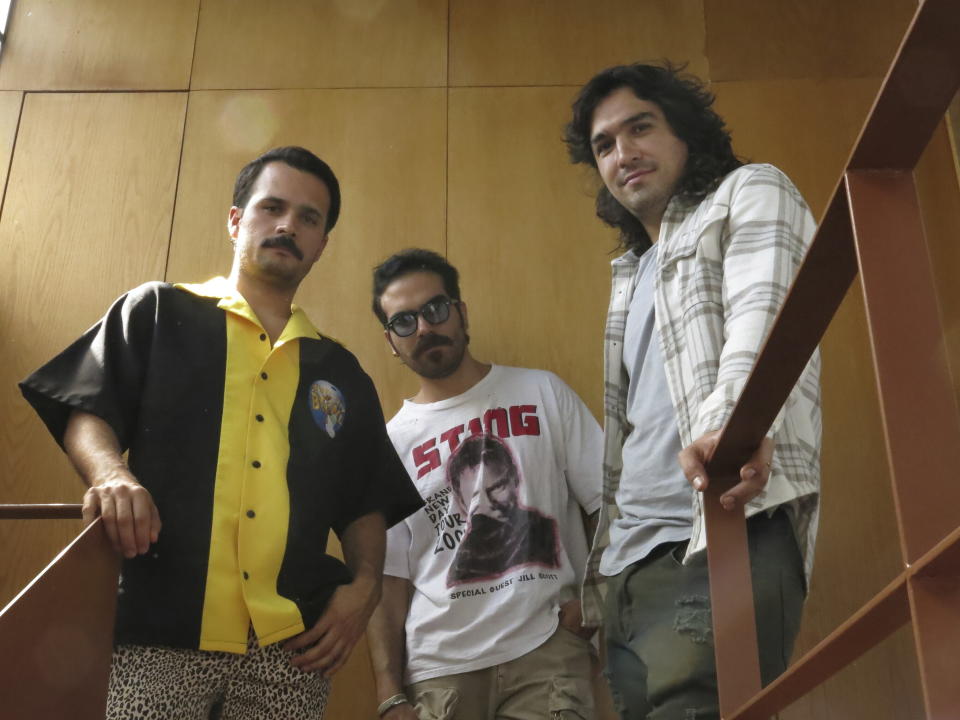 Members of the Mexican band Midnight Generation; Fernando Mares, from left, Samuel Marquez and Luis Carlos Balderrrama, pose for a portrait in Mexico City on Thursday, Sept. 28, 2023. (AP Photo/Berenice Bautista)