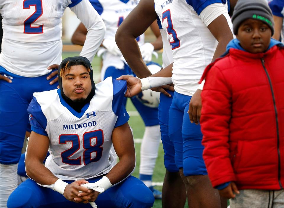 Millwood's Rickey Hunt Jr. (28) reacts following the Class 2A state football championship between Millwood and Washington at Chad Richison Stadium in Edmond, Okla., Saturday, Dec.10, 2022. 