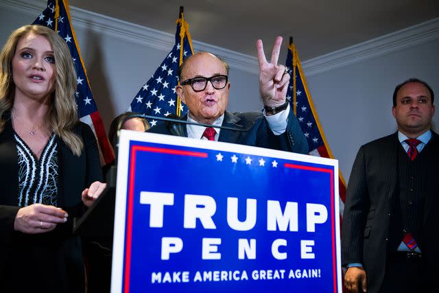 <p>Tom Williams/CQ-Roll Call, Inc via Getty Images</p> Boris Epshteyn, right, attends a press conference hosted by Donald Trump's legal team after the 2020 presidential election