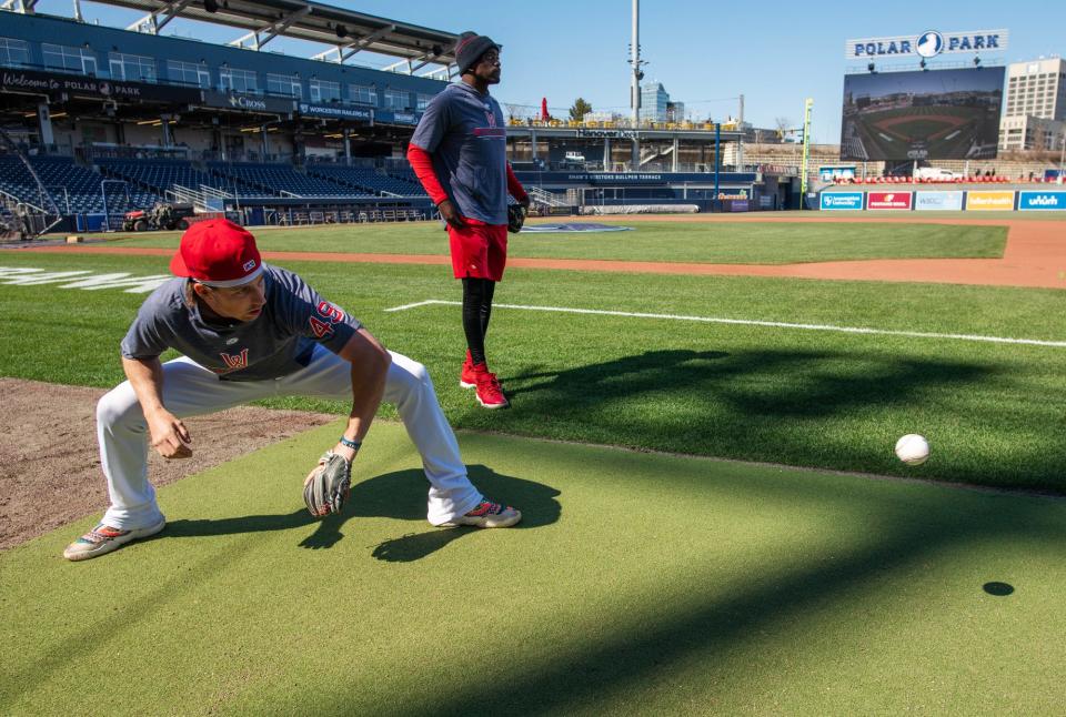 WooSox players Nick Sogard, left, and Marcus Wilson practice fielding ground balls Wednesday at Polar Park.